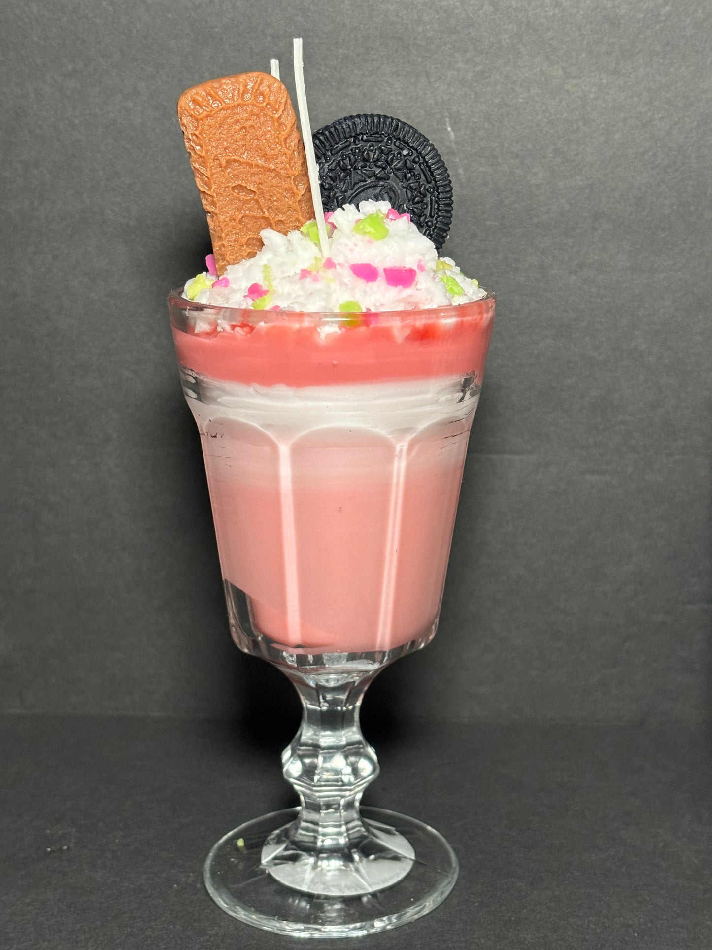 Strawberry sundae candle with cookies and sprinkles
